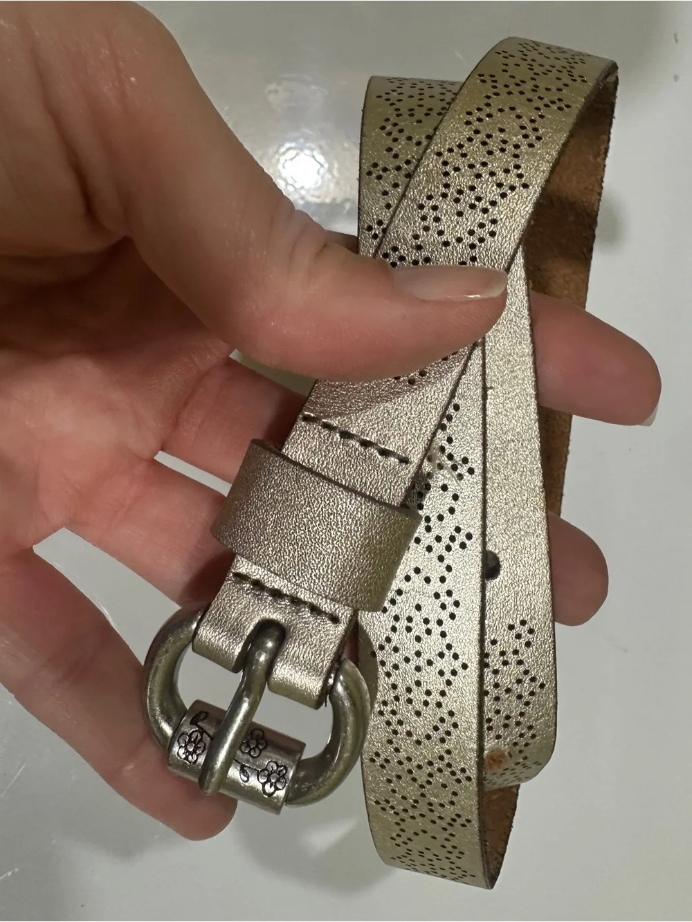 Fossil Metallic Gold Perforated Leather Belt with Floral Buckle